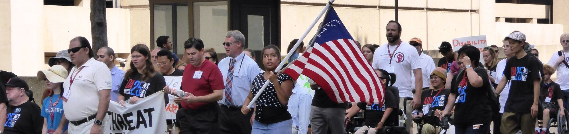 Gril with flag in Washington DC during ADA celebration